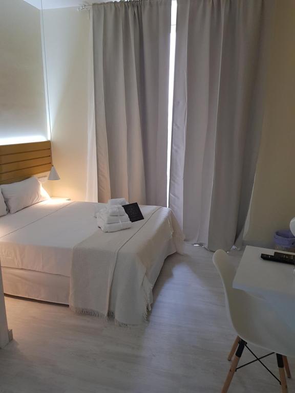 Cama o camas de una habitación en Le Petit Palü-Fuencarral