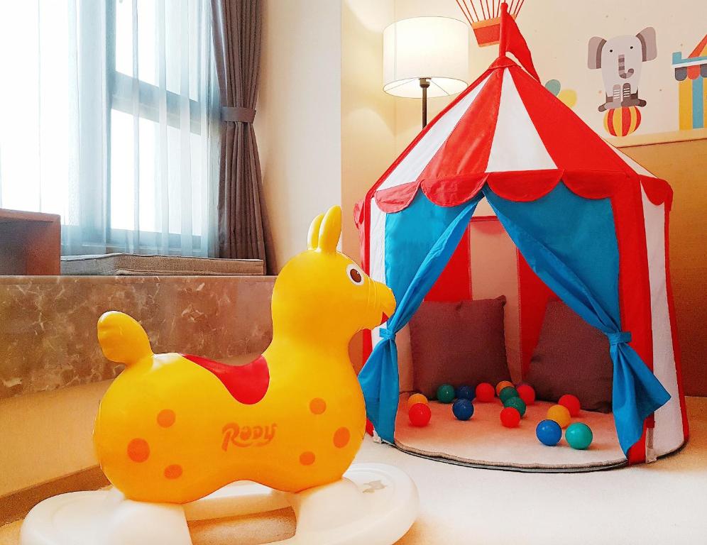 a toy duck next to a play tent at Tsun Huang Hotel in Chiayi City