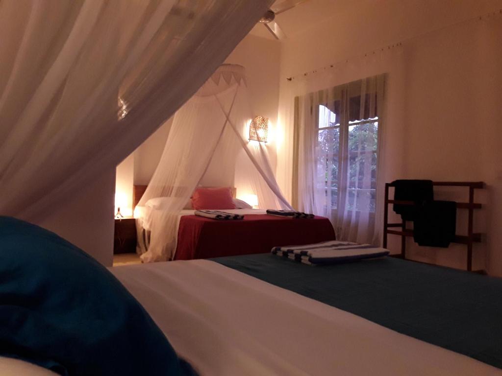 Postel nebo postele na pokoji v ubytování Casa Maria