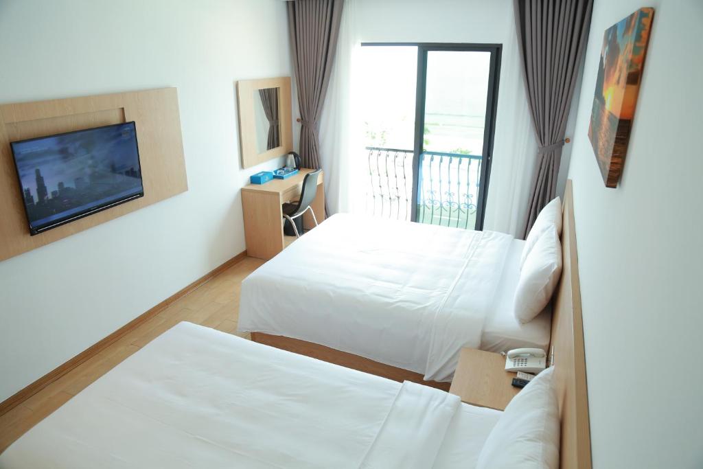 Gold Boutique Hotel Danang - Camera Tripla Deluxe Con Vista Mare