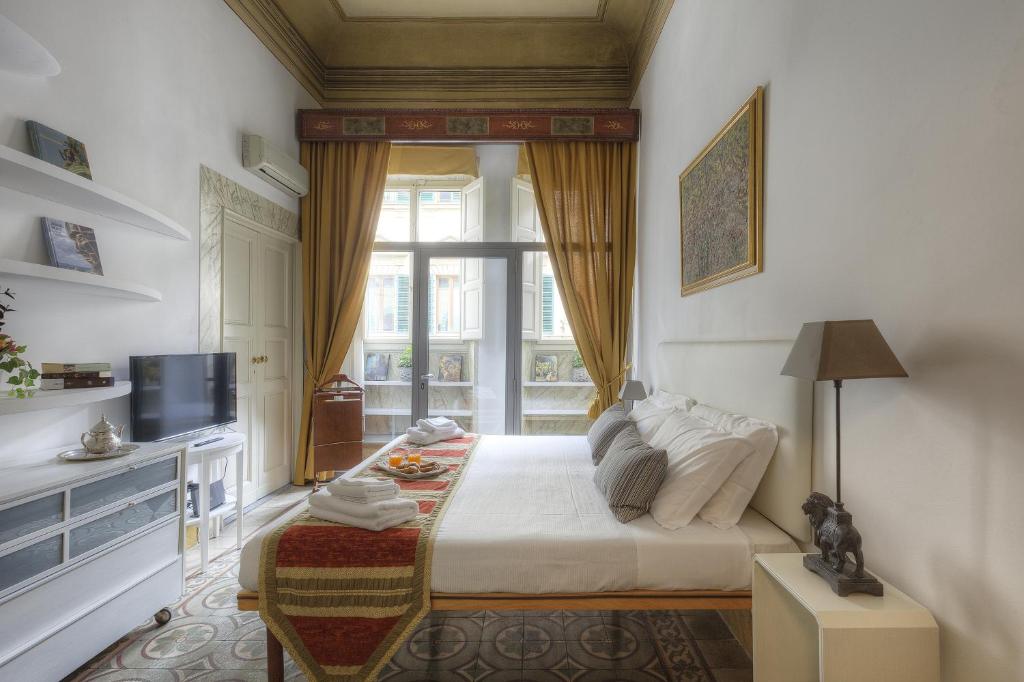 Gulta vai gultas numurā naktsmītnē Duomo Suite Central Home