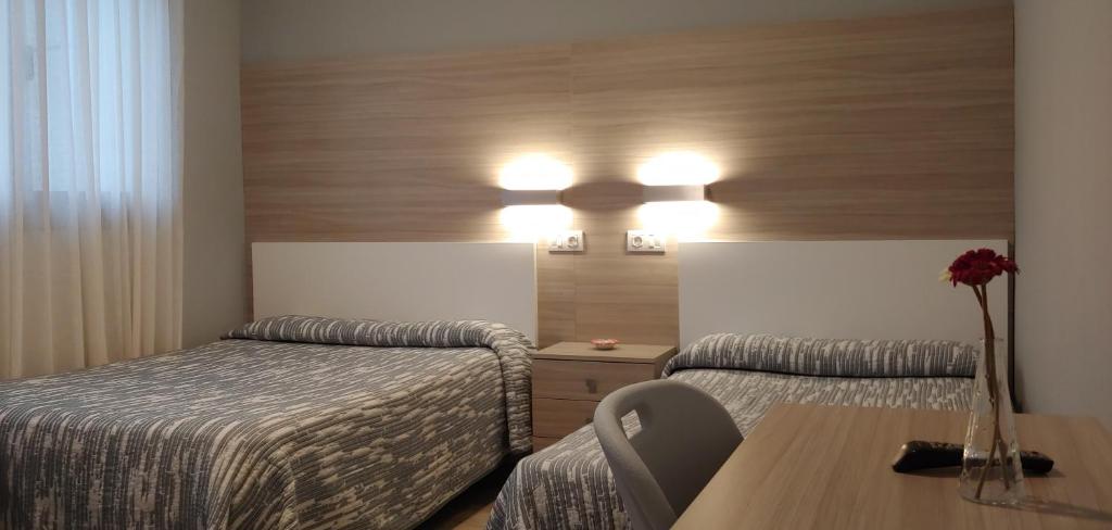 Postel nebo postele na pokoji v ubytování Hotel Goizalde