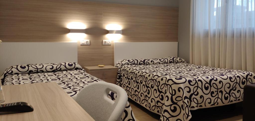 Postel nebo postele na pokoji v ubytování Hotel Goizalde