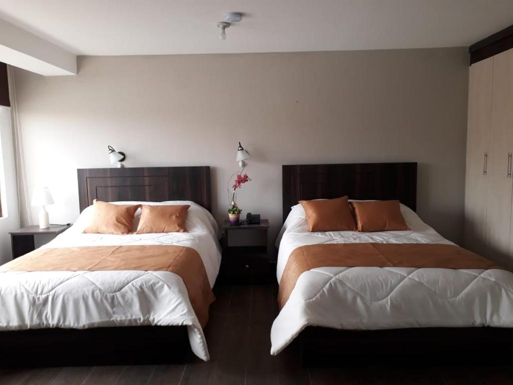 Postel nebo postele na pokoji v ubytování Hotel La Algodonera