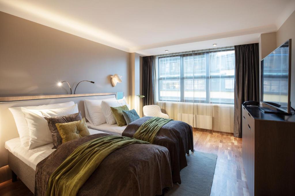 Postel nebo postele na pokoji v ubytování Clarion Hotel The Hub