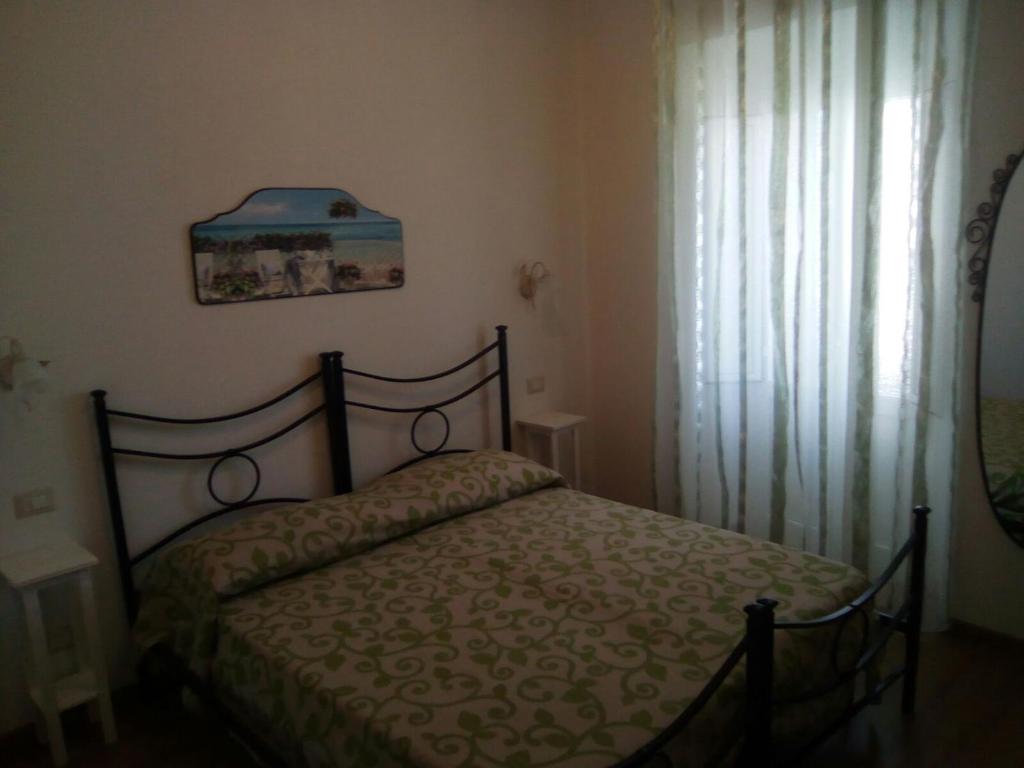 Postel nebo postele na pokoji v ubytování b&b ilfenicottero