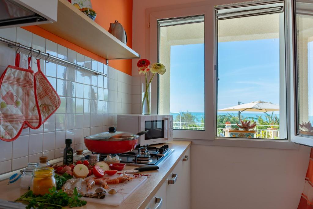 Kuchyň nebo kuchyňský kout v ubytování Lumia Case Vacanze