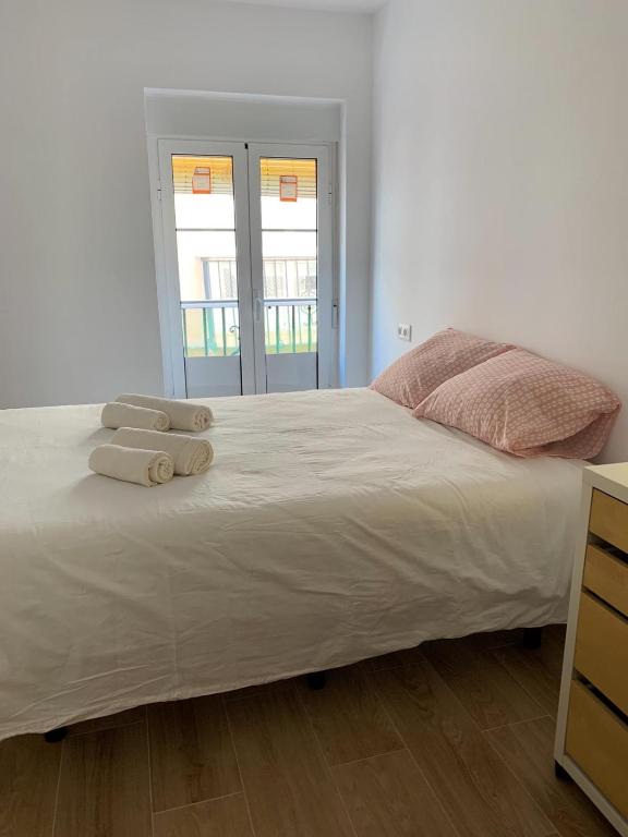 Postel nebo postele na pokoji v ubytování Casa Conchita