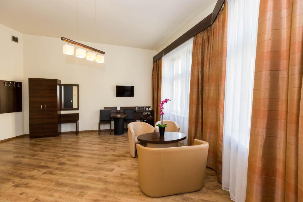 TV a/nebo společenská místnost v ubytování Spatz Aparthotel