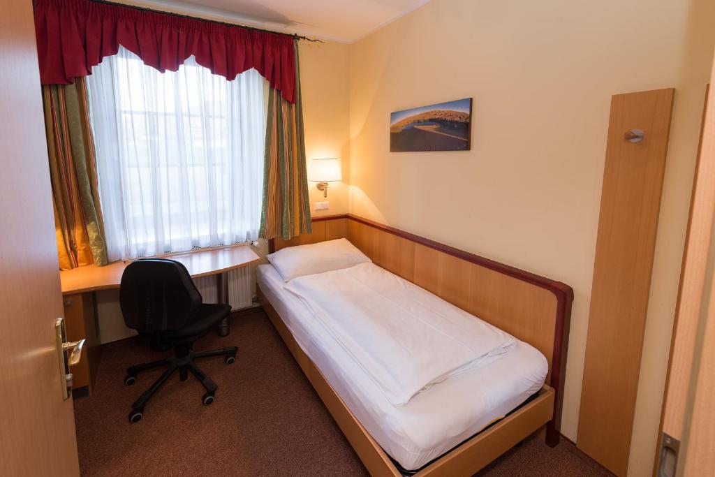 Voodi või voodid majutusasutuse Workers Castle Apartments für die besten Monteure toas