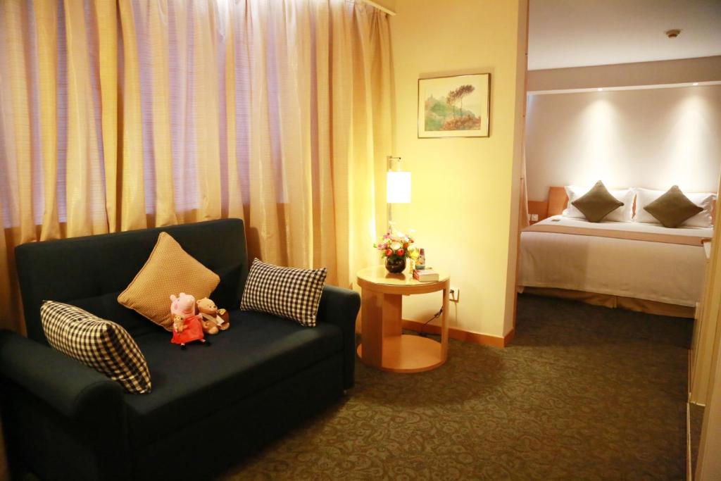 Postel nebo postele na pokoji v ubytování Jinglun Hotel Beijing