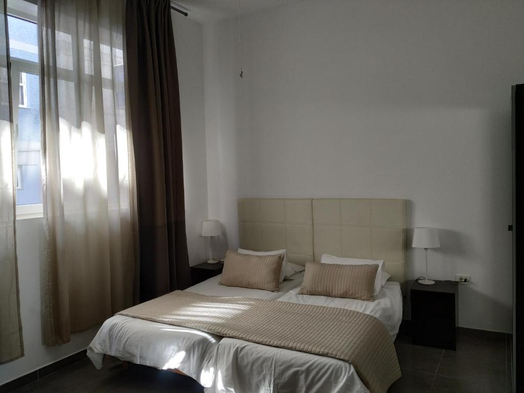 Postel nebo postele na pokoji v ubytování Apartamentos El Patio