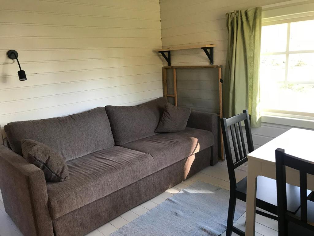 Posezení v ubytování Sandvikengården Stugby
