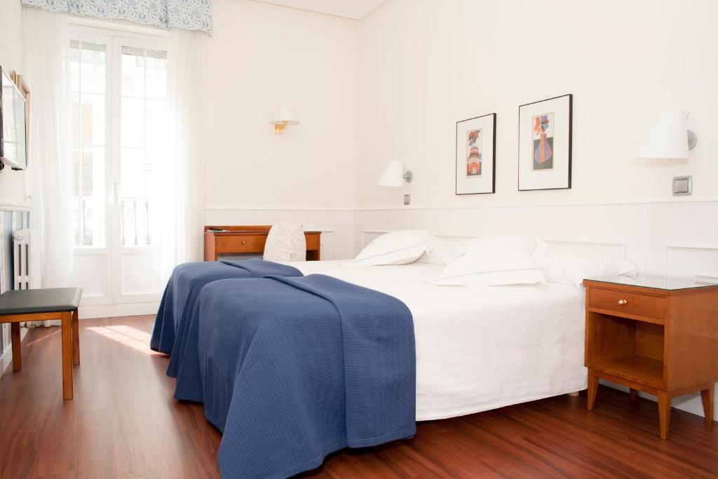 Postel nebo postele na pokoji v ubytování Hotel Sauce