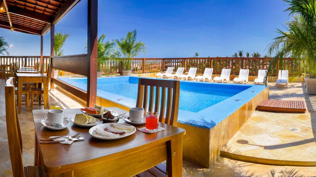 Bazén v ubytování Mini Hotel Dunas nebo v jeho okolí