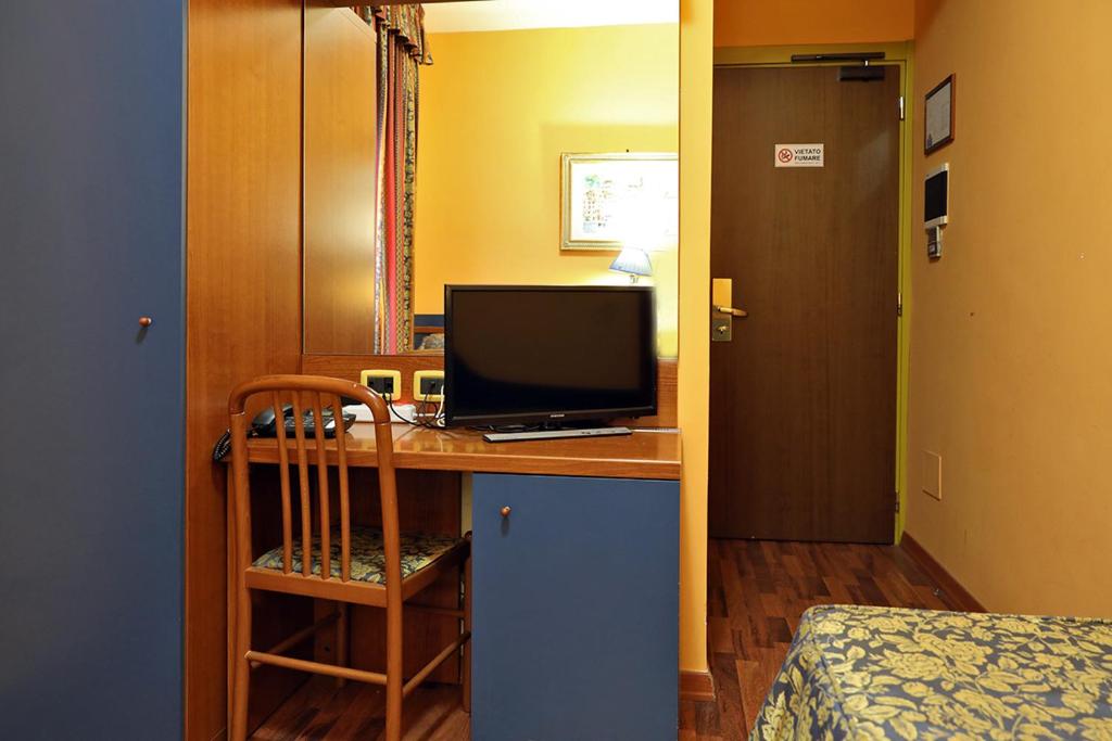 TV a/nebo společenská místnost v ubytování Hotel Al Castello