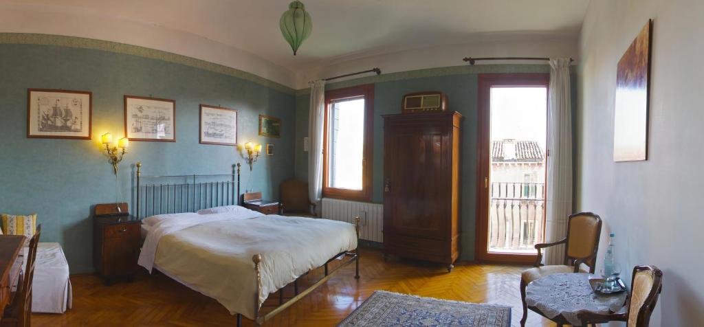 Postel nebo postele na pokoji v ubytování B&B S.Marco