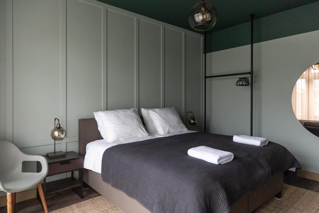 Postel nebo postele na pokoji v ubytování Seabreeze Suites - near Zandvoort aan Zee