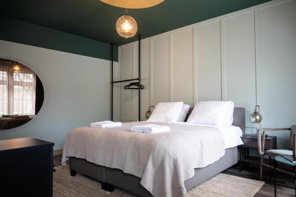 Postel nebo postele na pokoji v ubytování Seabreeze Suites - near Zandvoort aan Zee