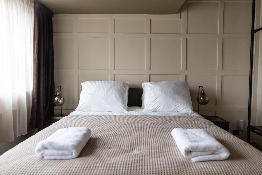 Postel nebo postele na pokoji v ubytování Seabreeze Suites - near Zandvoort aan Zee