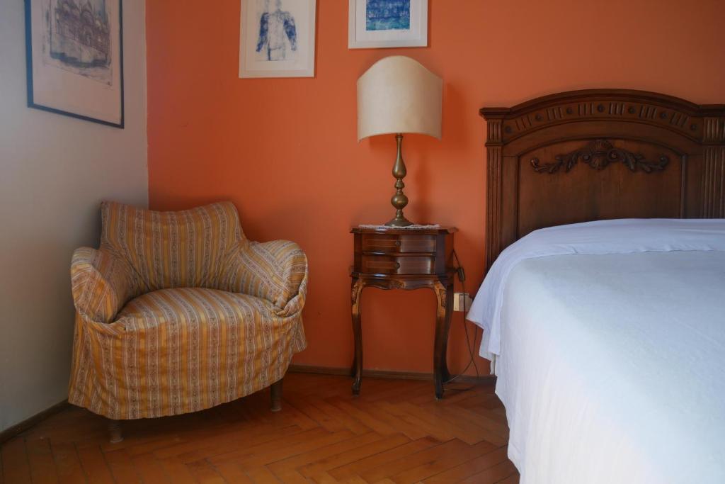 Postel nebo postele na pokoji v ubytování B&B S.Marco