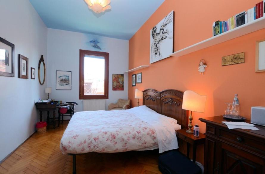 Postel nebo postele na pokoji v ubytování B&B S.Marco
