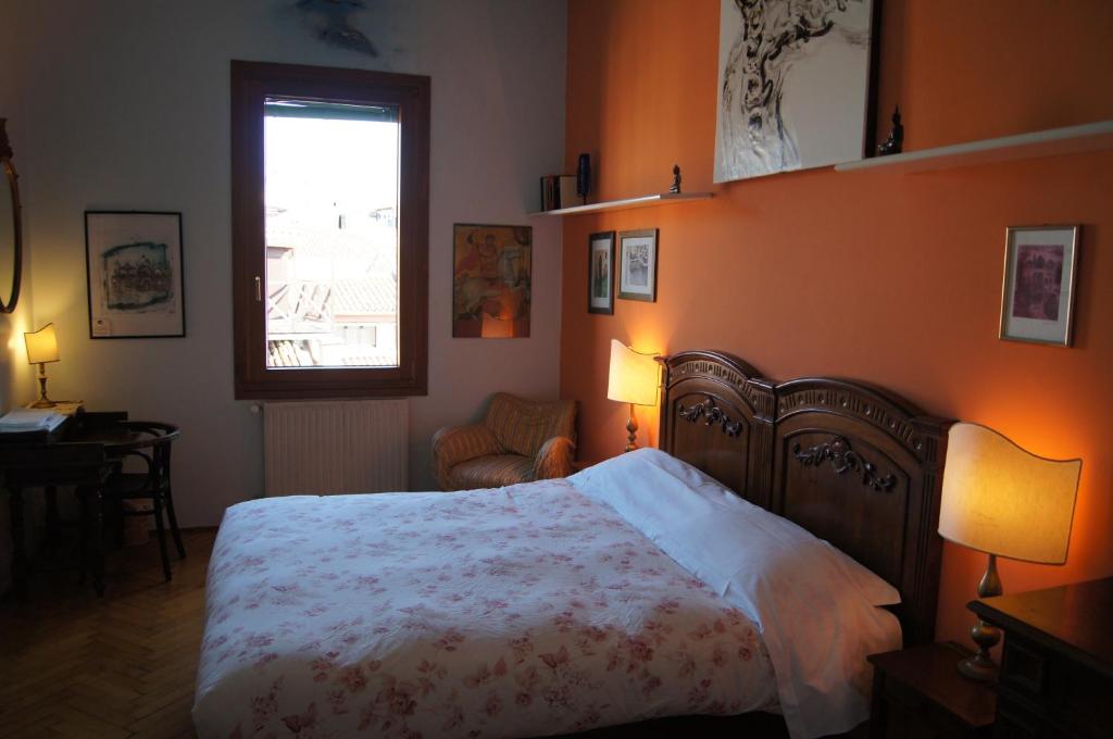 Postel nebo postele na pokoji v ubytování B&B S.Marco