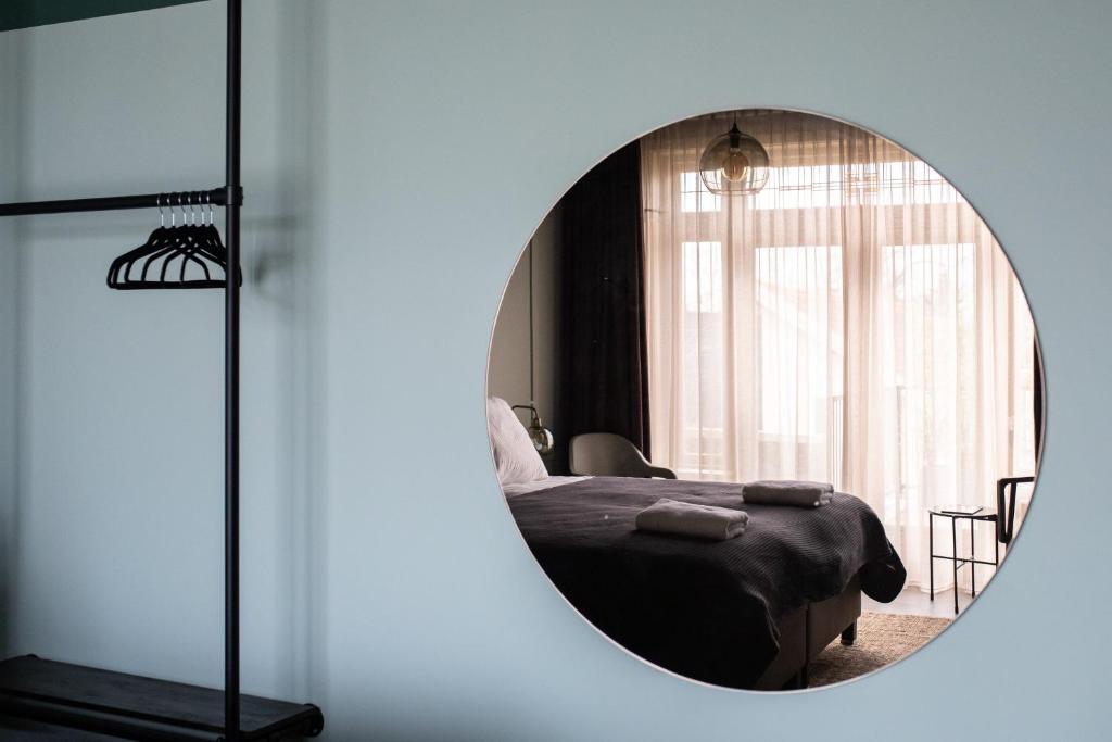 Postel nebo postele na pokoji v ubytování Seabreeze Suites - near Zandvoort aan Zee