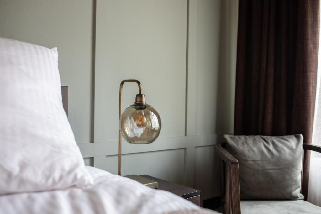 Postel nebo postele na pokoji v ubytování Seabreeze Suites - near Zandvoort aan Zee