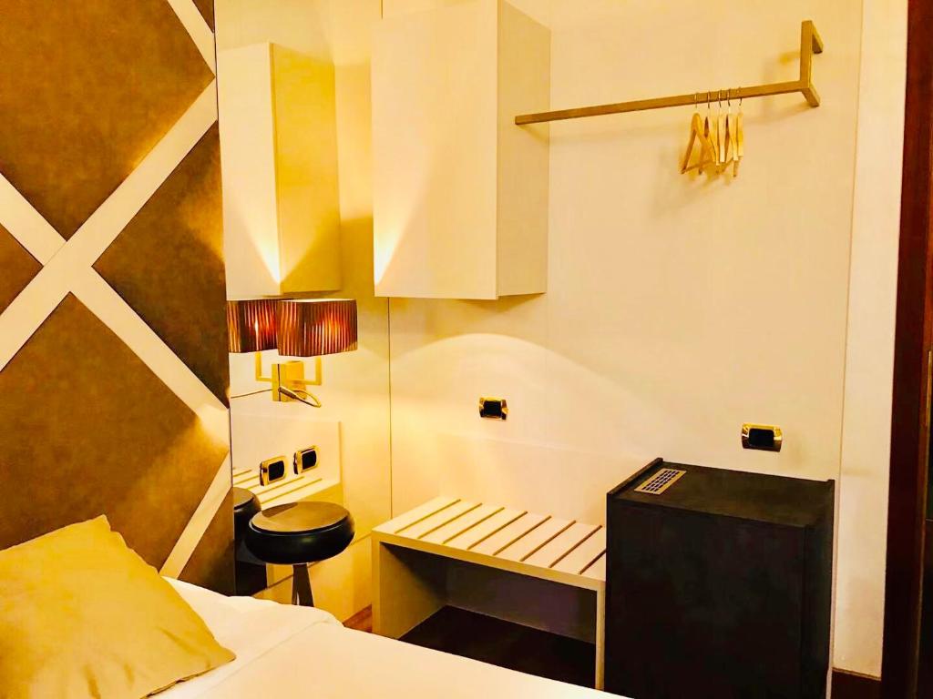 Posteľ alebo postele v izbe v ubytovaní Hotel Mythos