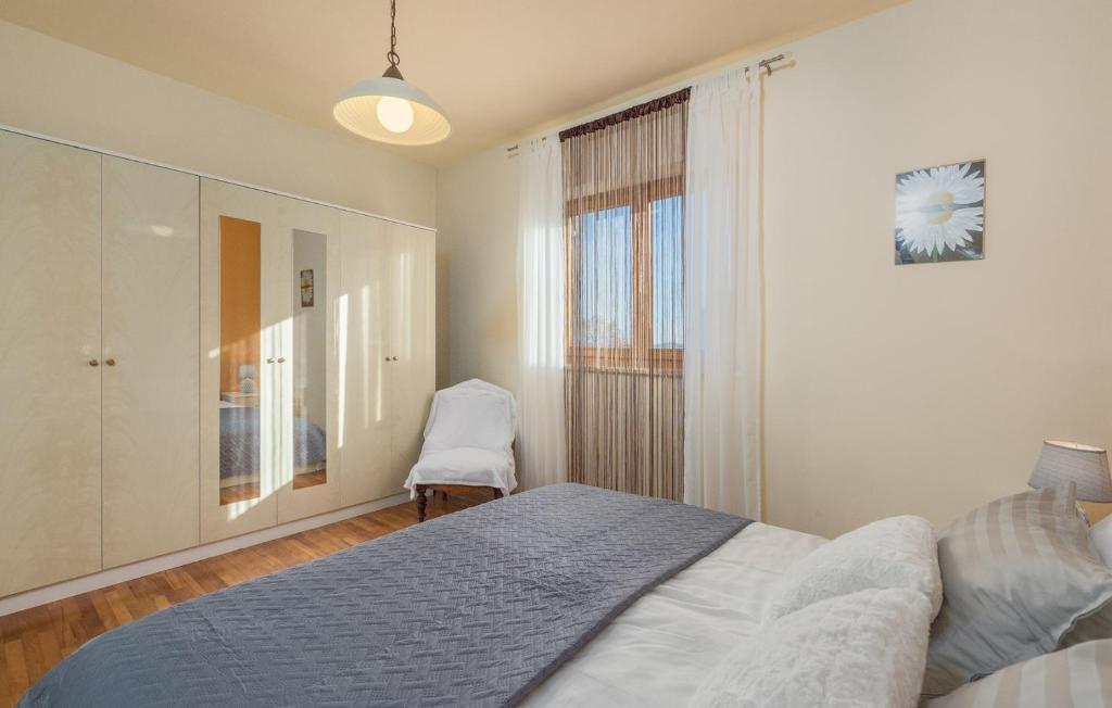 Postel nebo postele na pokoji v ubytování Apartmani Katalin
