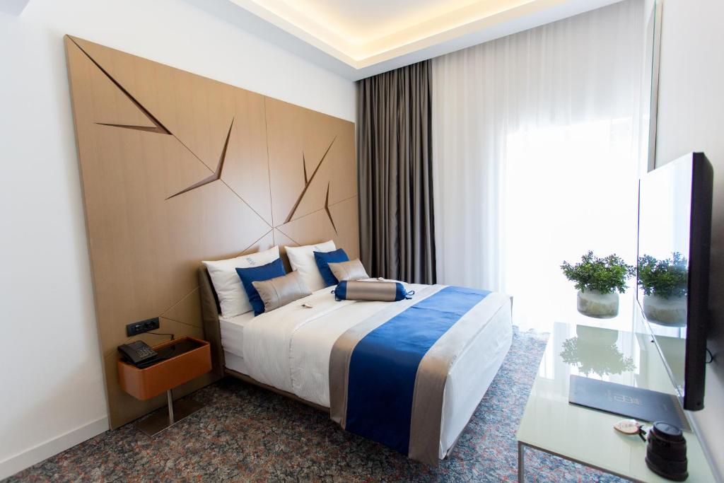 Postel nebo postele na pokoji v ubytování Hotel Austria & Bosna