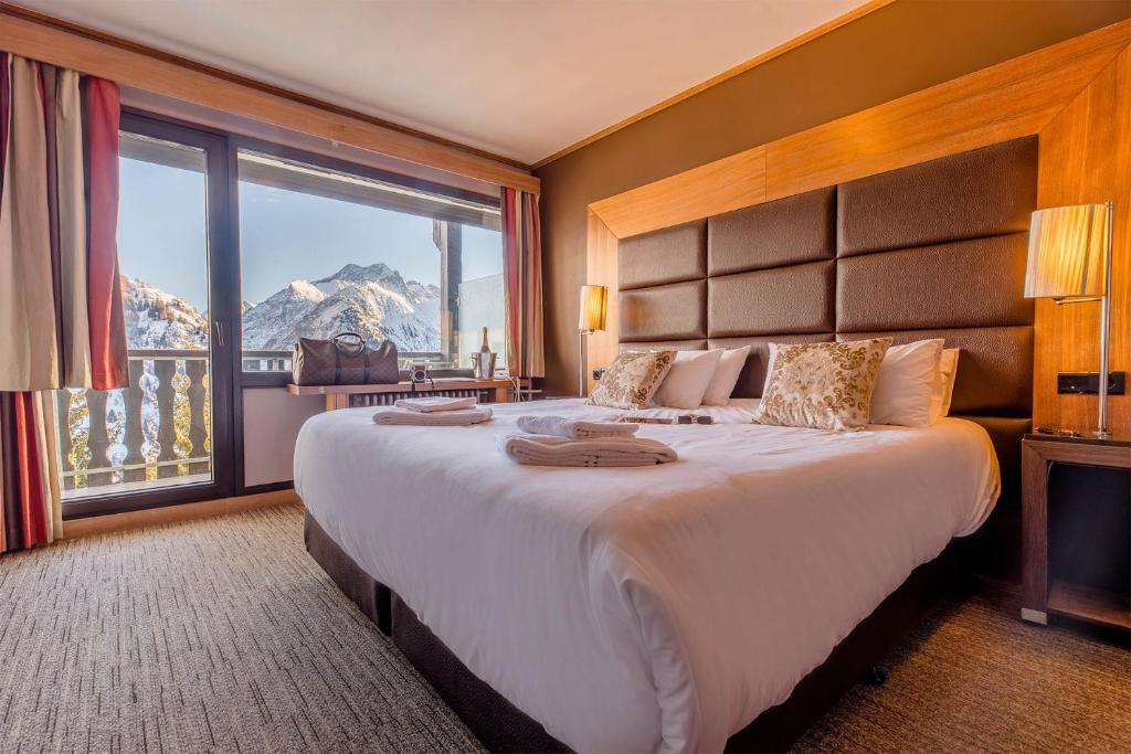 Ένα ή περισσότερα κρεβάτια σε δωμάτιο στο Madame Vacances Hôtel Ibiza