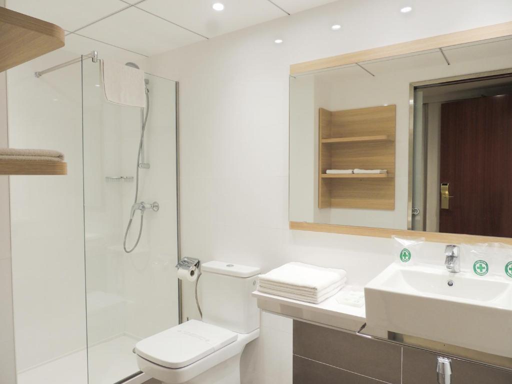 Kúpeľňa v ubytovaní Hotel Cesar Augustus