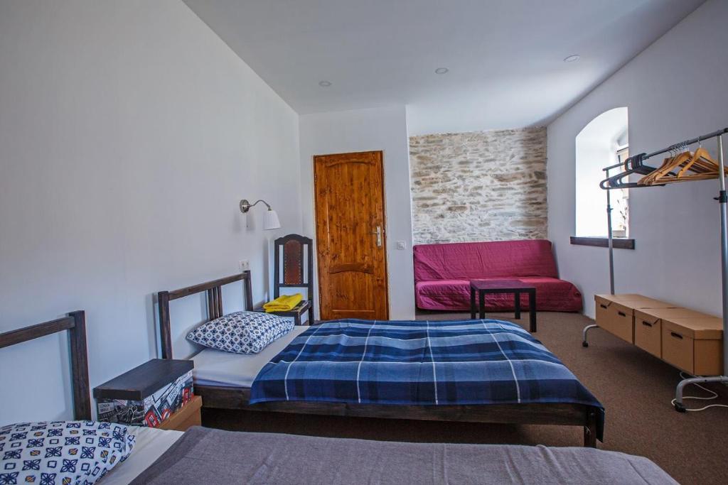 Postel nebo postele na pokoji v ubytování Statek "Two brooms", Apartment