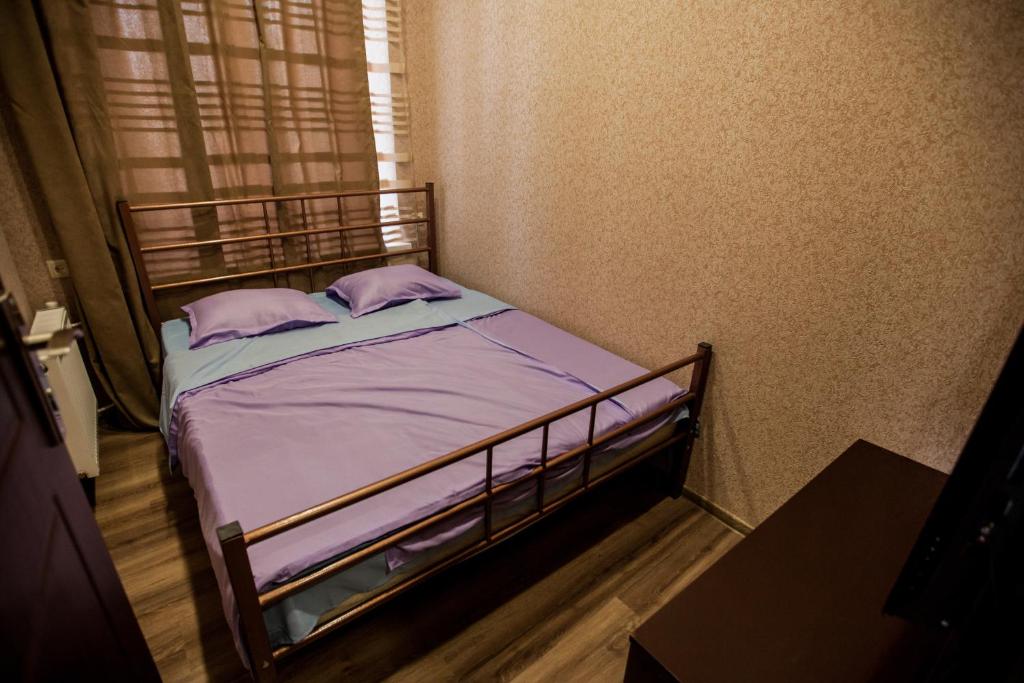 Postel nebo postele na pokoji v ubytování Guest House Didis