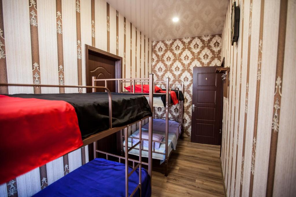 Postel nebo postele na pokoji v ubytování Guest House Didis
