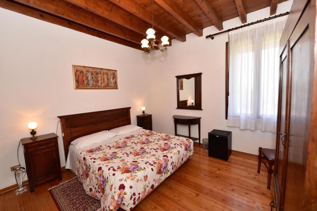 Postel nebo postele na pokoji v ubytování B&B Kiwi