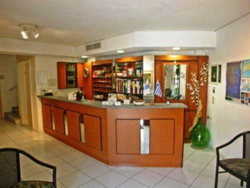 The lounge or bar area at Emily Hotel