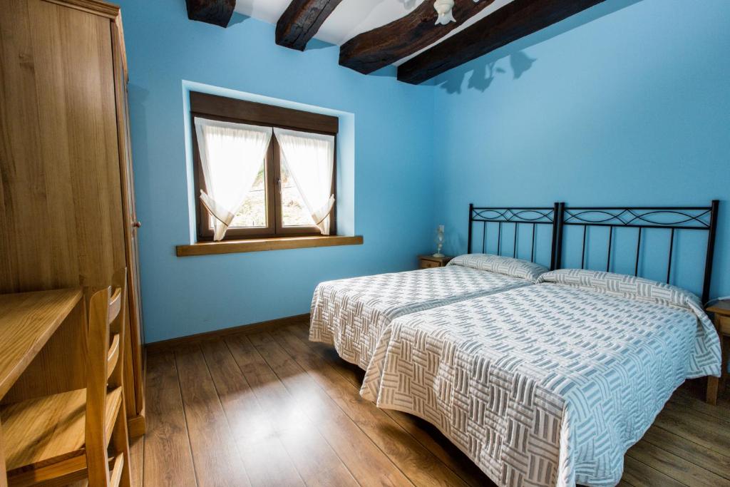 Cama o camas de una habitación en La Dobra de liebana