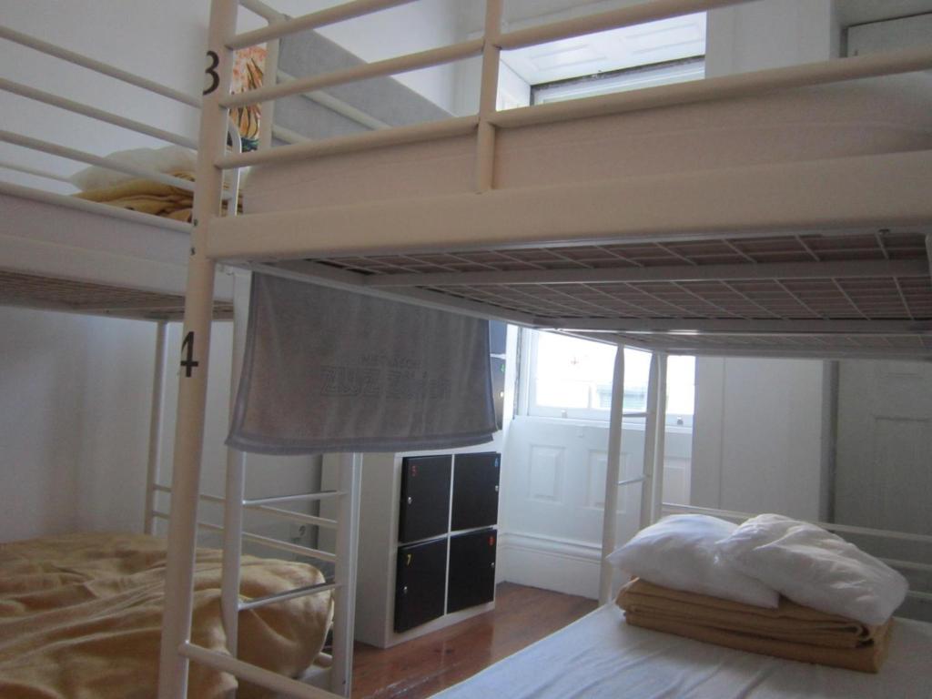 Postel nebo postele na pokoji v ubytování Hostel Prime Guimaraes