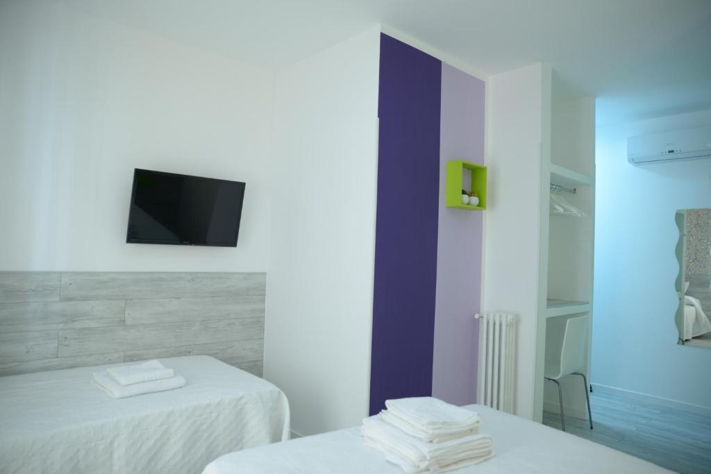 Una cama o camas en una habitación de Nersan