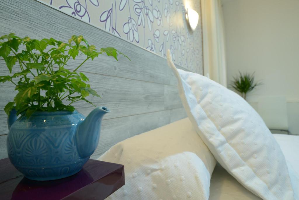 Una cama o camas en una habitación de Nersan