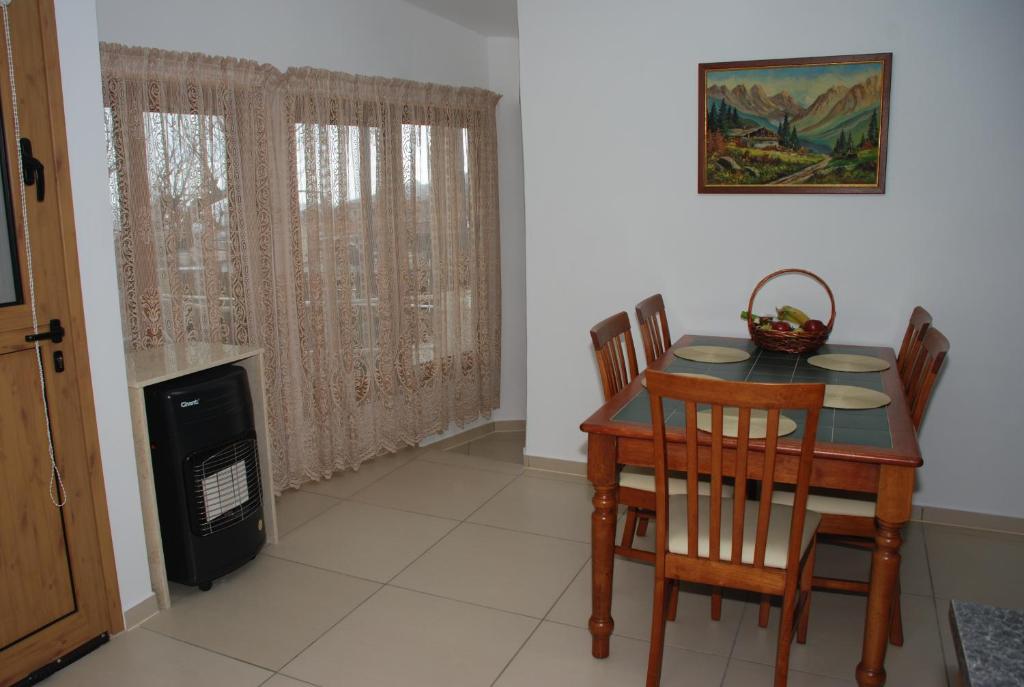 Kuchyň nebo kuchyňský kout v ubytování Kanarinis Apartments