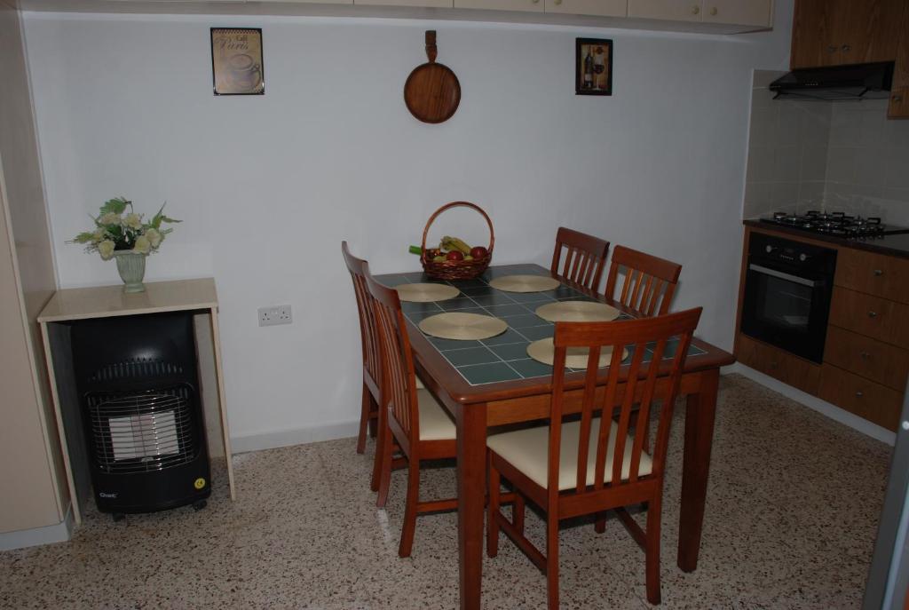 Kuchyň nebo kuchyňský kout v ubytování Kanarinis Apartments