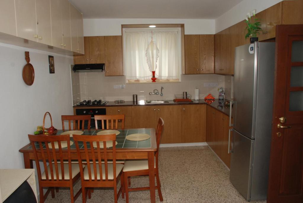 Kuchyň nebo kuchyňský kout v ubytování Kanarinis Apartments