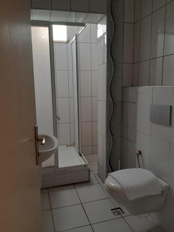 Koupelna v ubytování Mustafa Hotel