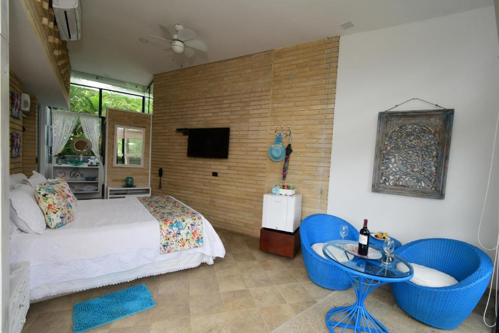 TV a/nebo společenská místnost v ubytování Hotel Casa Ambrosia
