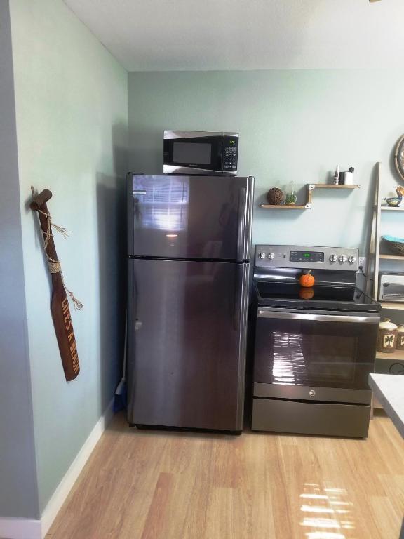 A cozinha ou kitchenette de Come Friday Cottages