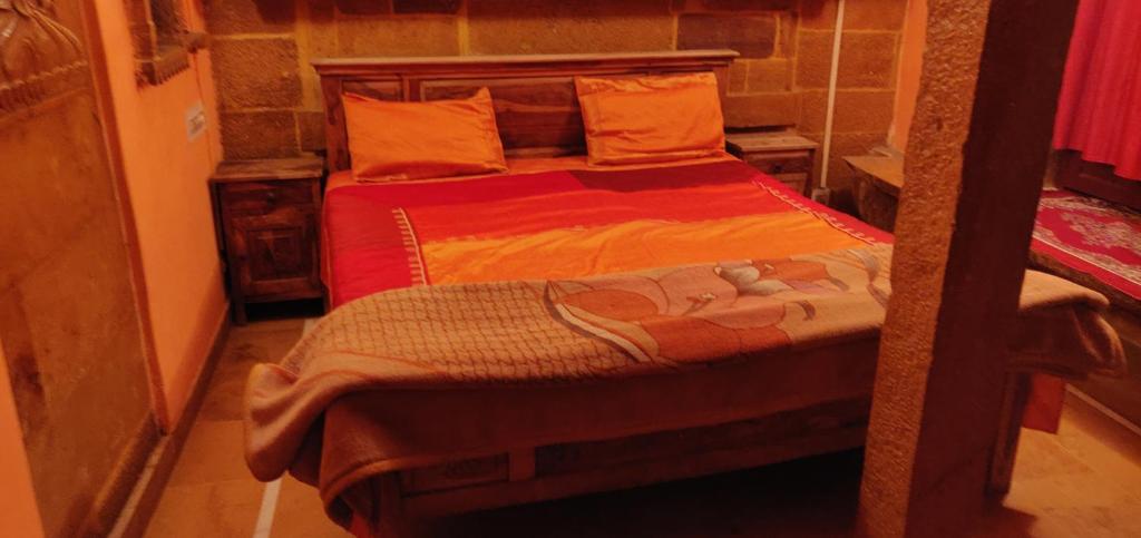 Postel nebo postele na pokoji v ubytování Hotel Deep Mahal